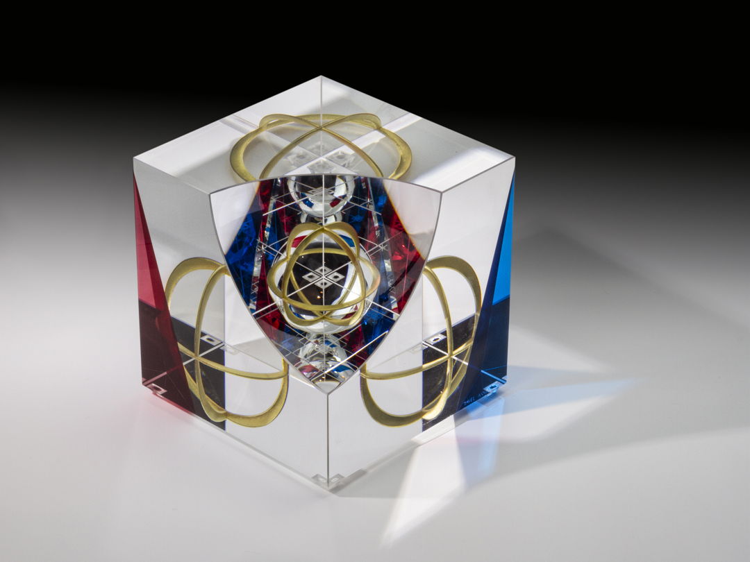 Optical glass that has been cold-worked: a centuries old Bohemian technique using no heat  but rather room temperature glass is shaped using water and abrasives in conjunction with lapidary tools. The techniques involved are cutting  grinding  polishing  laminating and coloring.