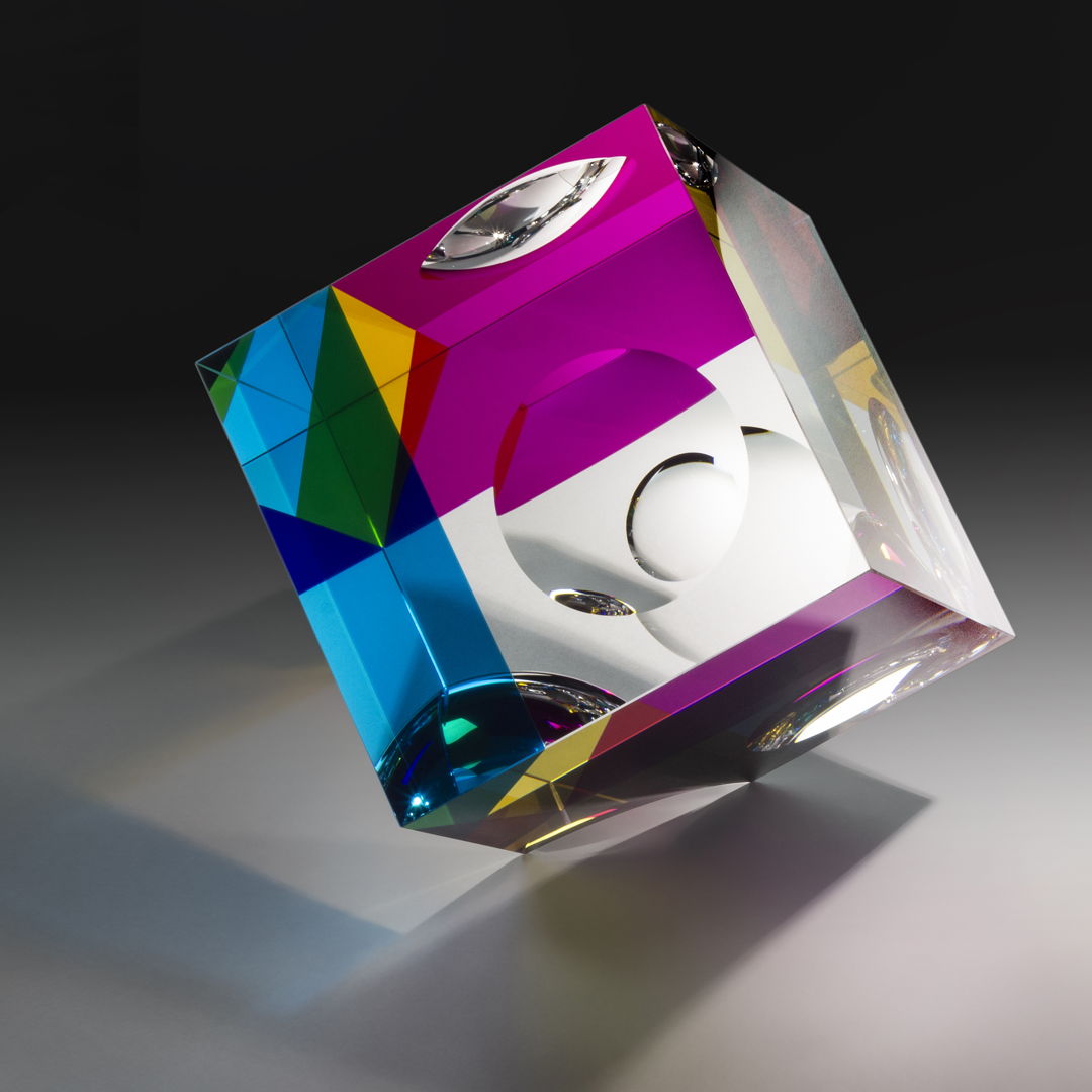 Optical glass that has been cold-worked: a centuries old Bohemian technique using no heat  but rather room temperature glass is shaped using water and abrasives in conjunction with lapidary tools. The techniques involved are cutting  grinding  polishing  laminating and coloring.