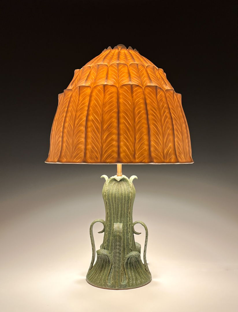 Translucent porcelain shade and plant-like earthenware base