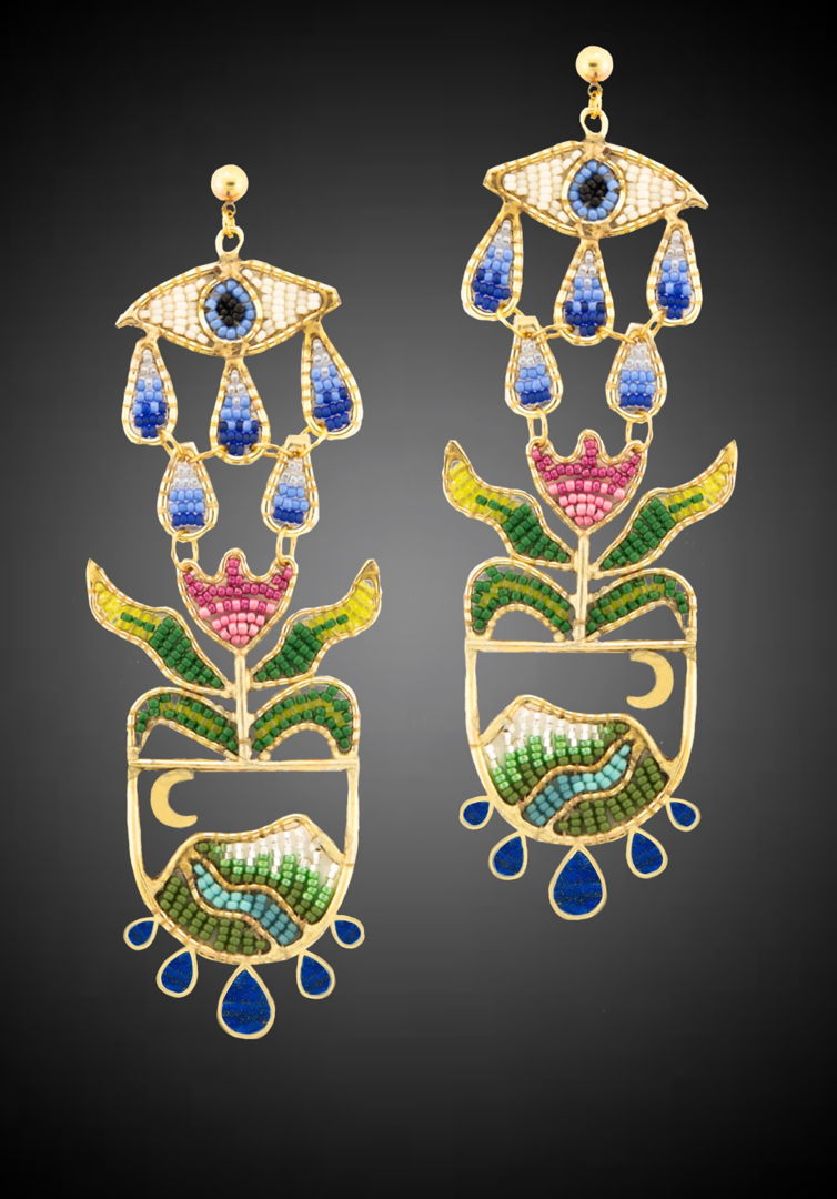 18k Gold Filled metal framed interwoven with Glass Seed Beads. Set with Lapis.
