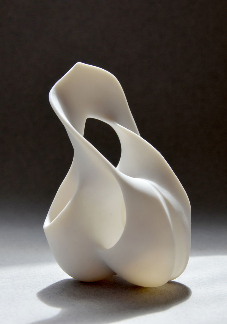 Porcelain sculpture. It has a unglazed surface.