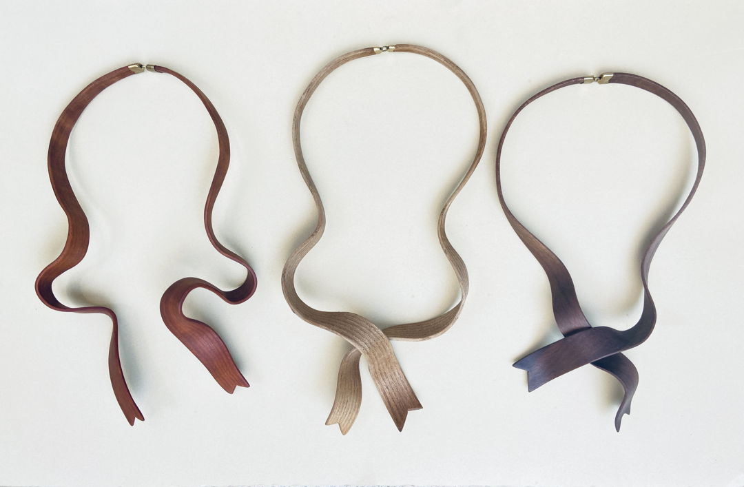 Steam-bent Cherry  Sassafras  Walnut with brass Hinge