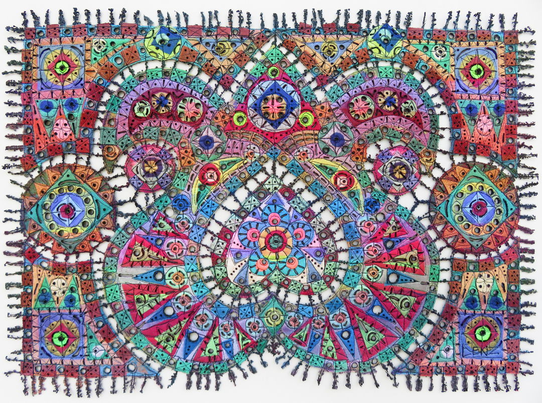 Colorful geometric pieces connected and embellished with thread, the center being an upsidedown heart.