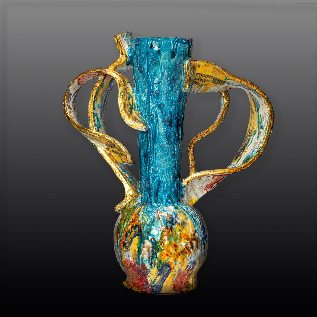 Handformed earthenware vessel sculpture created using a series of slumped forms parts of which are manipulated assembled into one of a kind artworks multifired for desired glaze effect and density