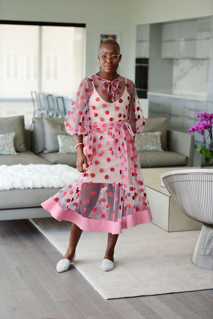 This skirt features side seam pockets and an elasticized waistband for a simple comfortable fit  and a self-tie belt attached at the side seams.