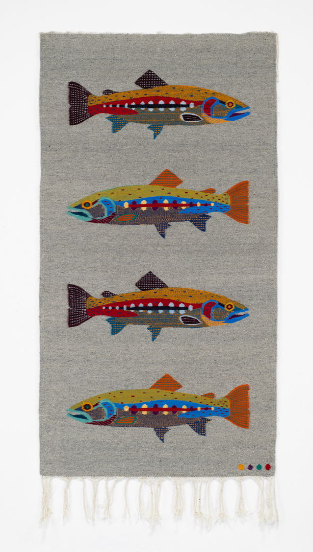 handweaving depicting 4 colorful fish in a neat stack