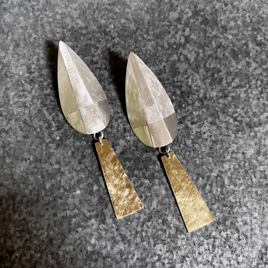 Hand-fabricated from sterling sheet and 18kt bimetal. Hand-sanded and textured. LTD. Edition