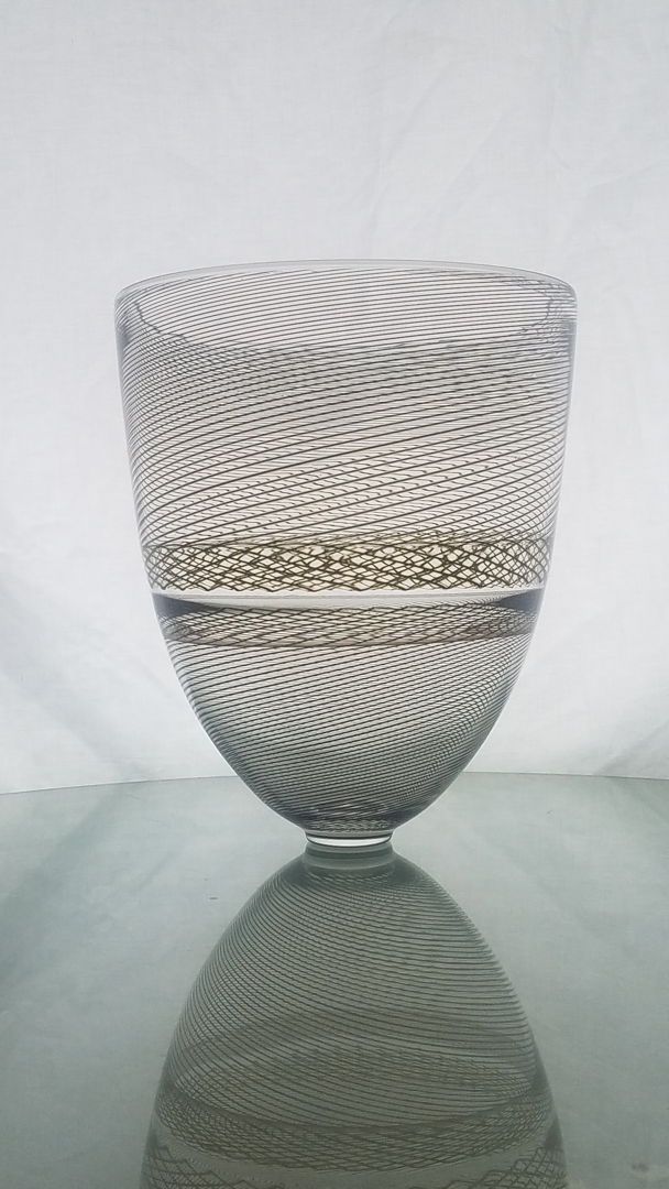 Using a combination of technique and optics  this series emphasizes linear distortion and severance. The patterning creates two versions of the ‘moire’ effect  a visual perception that occurs when viewing a set of lines over top of another. The visual distinction creates a simple  yet complex relationship between the levels of each work.