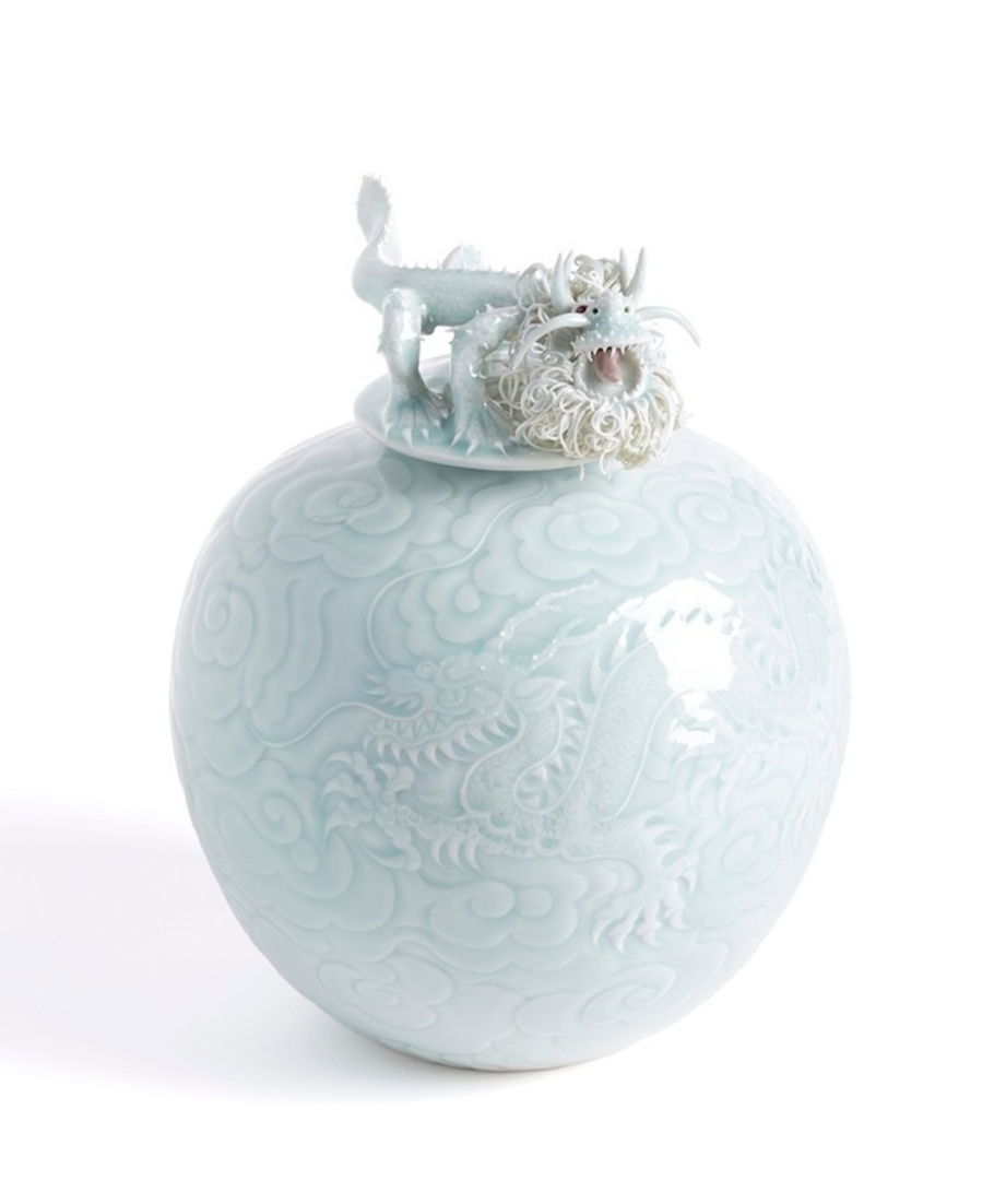 celadon vase with dragon motiff and dragon topper