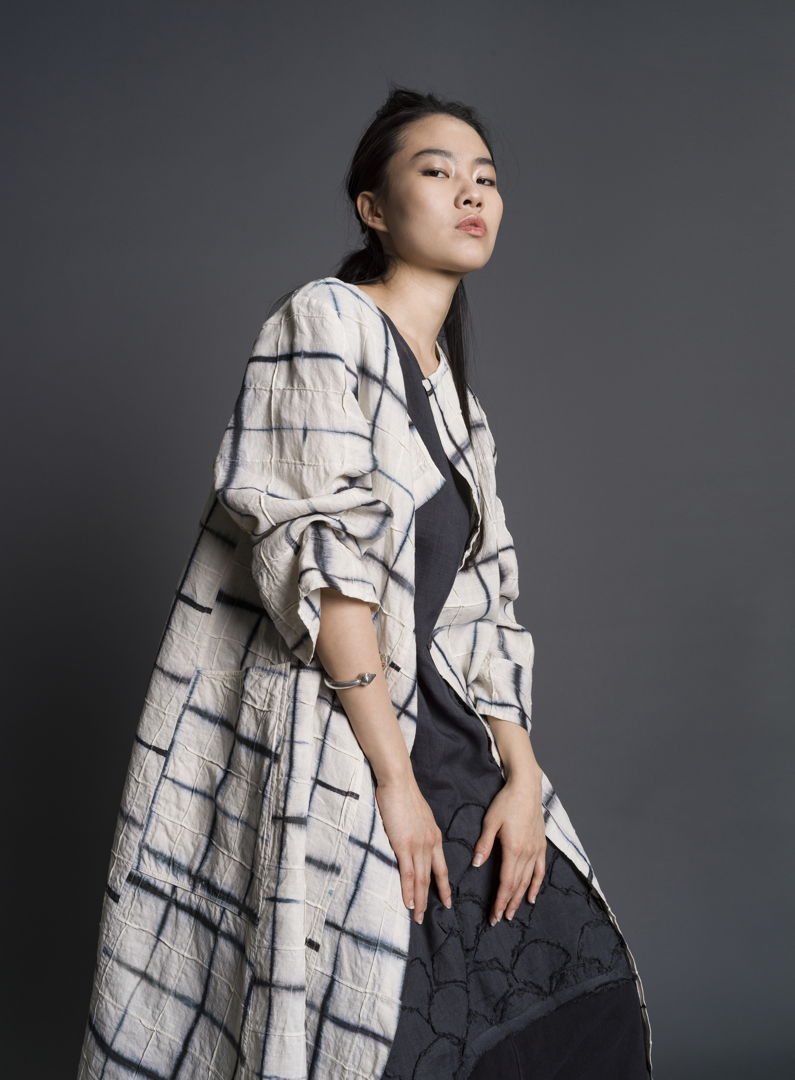 Hand-dyed shibori using sustainable dyes and linen. Stitched  hand-patterned  hand-cut. Worn with agekubi tunic.