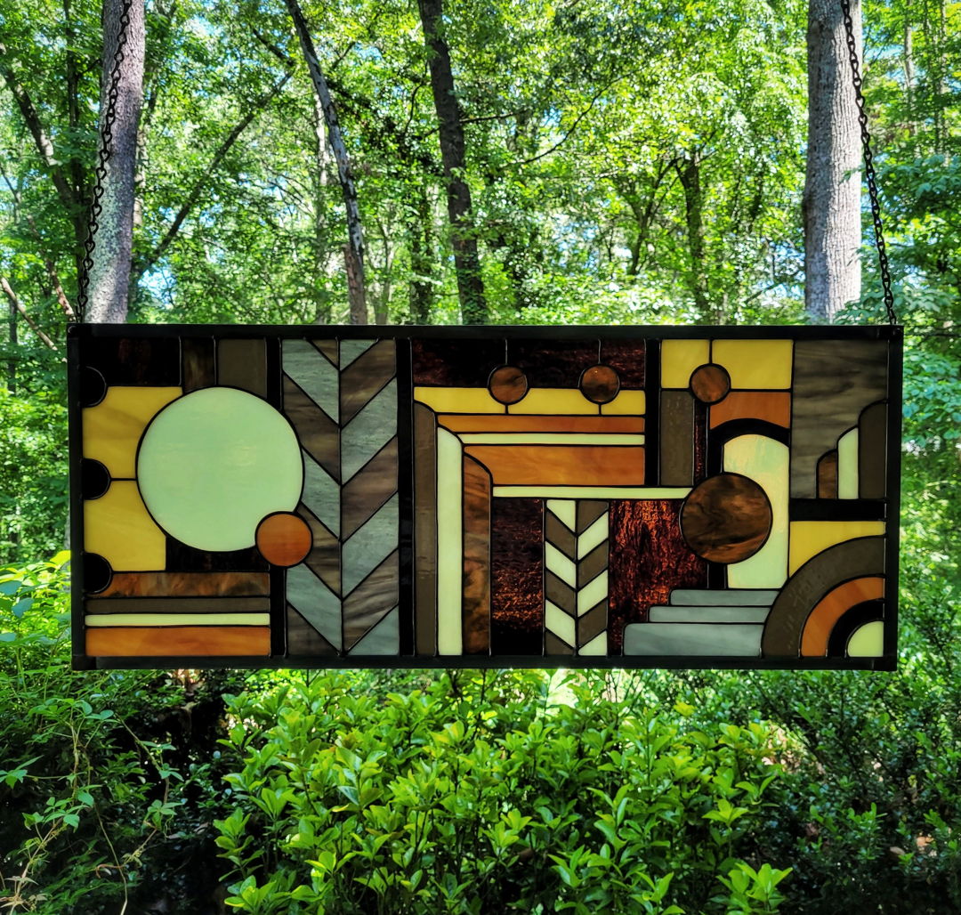 Handcrafted Art Deco abstract  butterscotch palette  traditional copper foil method  framed in zinc