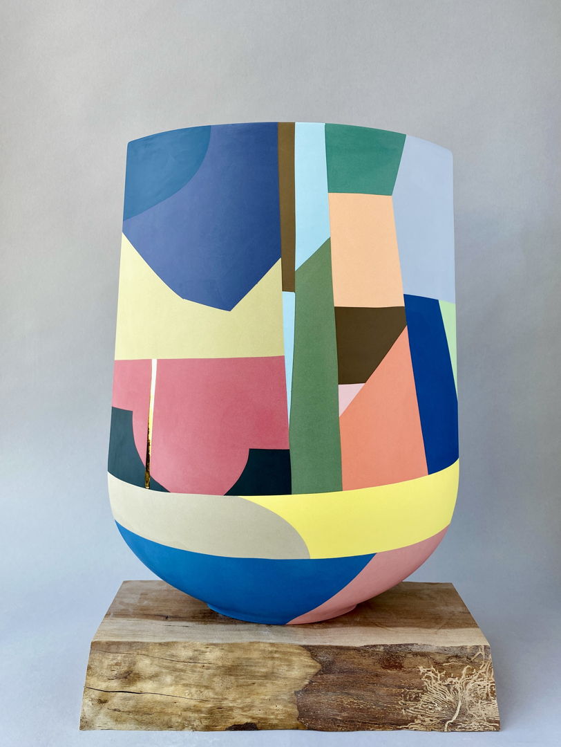 Made from thin slabs of pigmented porcelain fitted together and sanded  backed with white porcelain  cone 7 fired; additional 22k gold luster firing. Surface shows abstract imagery of locations and narratives intimate to me.