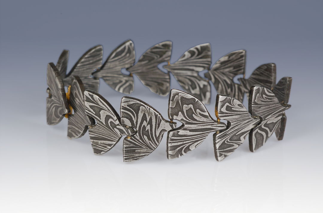 House made Damascus steel linked w/ 18K gold and hand made clasp