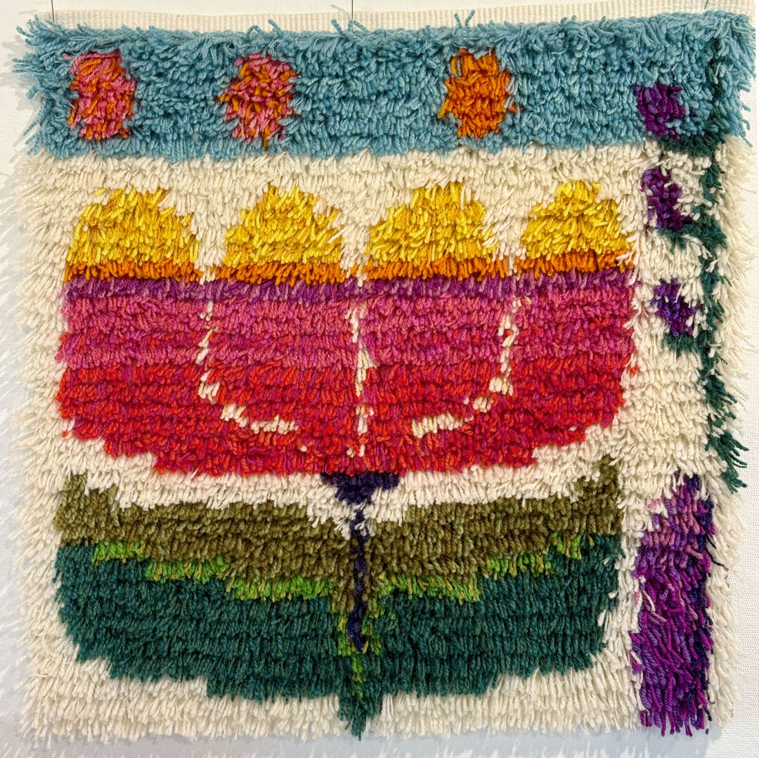 Handwoven backing of linen and wool. Hand knotted wool. Cut pile. To hang on the wall or use as a rug.