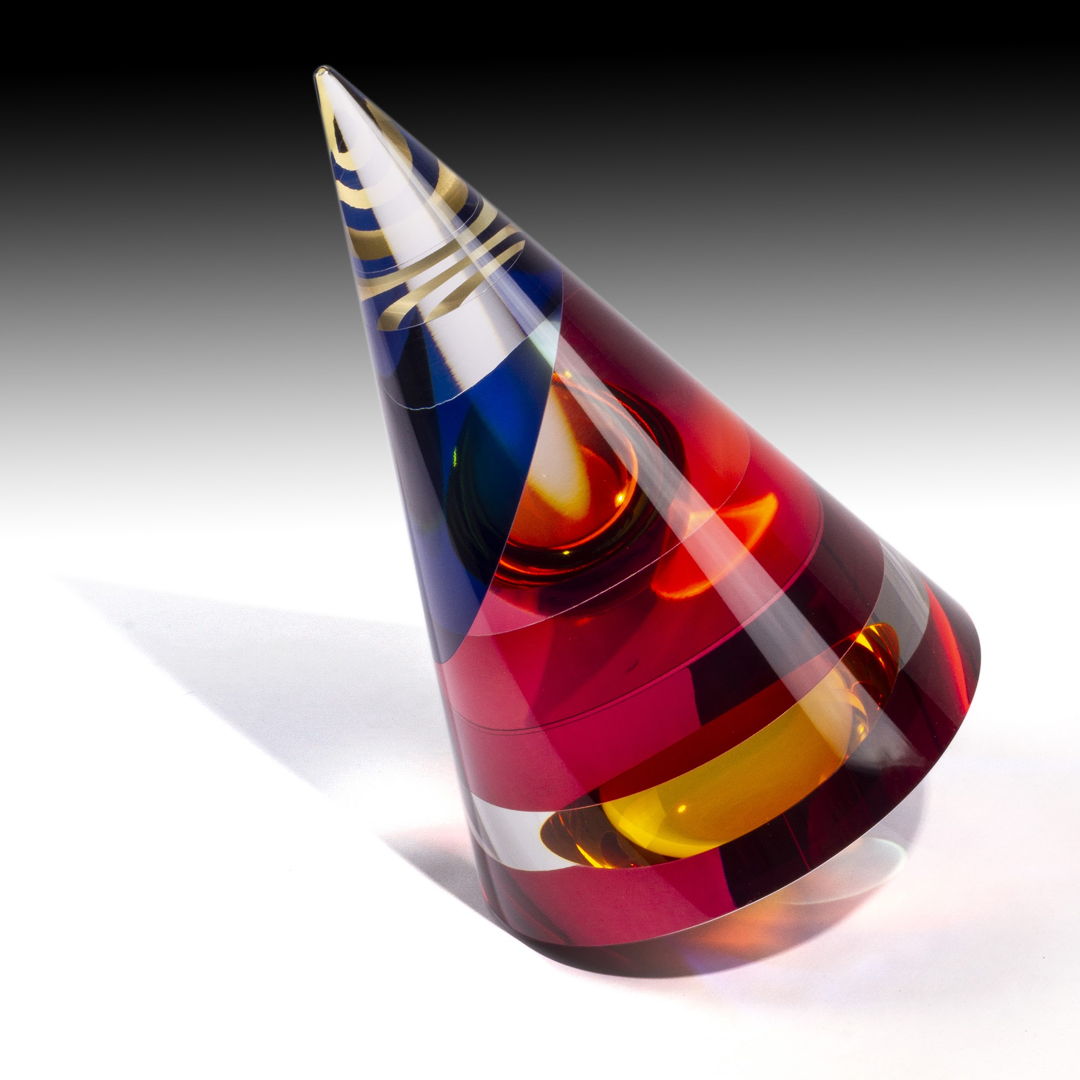 Optical glass that has been cold-worked: a centuries old Bohemian technique using no heat  but rather room temperature glass is shaped using water and abrasives in conjunction with lapidary tools. The techniques involved are cutting  grinding  polishing  laminating and coloring.