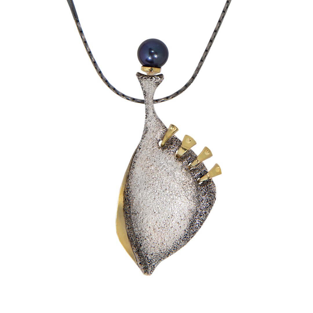 Beauty uplifts our spirits and touches our hearts. It will save the world. This rough textured necklace is from Aleksandra Vali's ''Forgotten in Time Collection'' Collection. It has a unique clasp. It is handmade in oxidized sterling silver  accented with 18 k gold and finished with Akoya pearl.