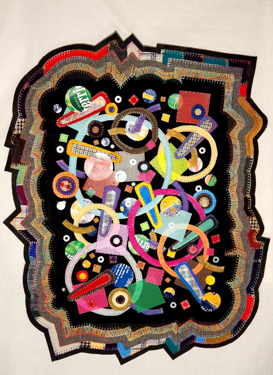 tapestry with colorful energetic shapes