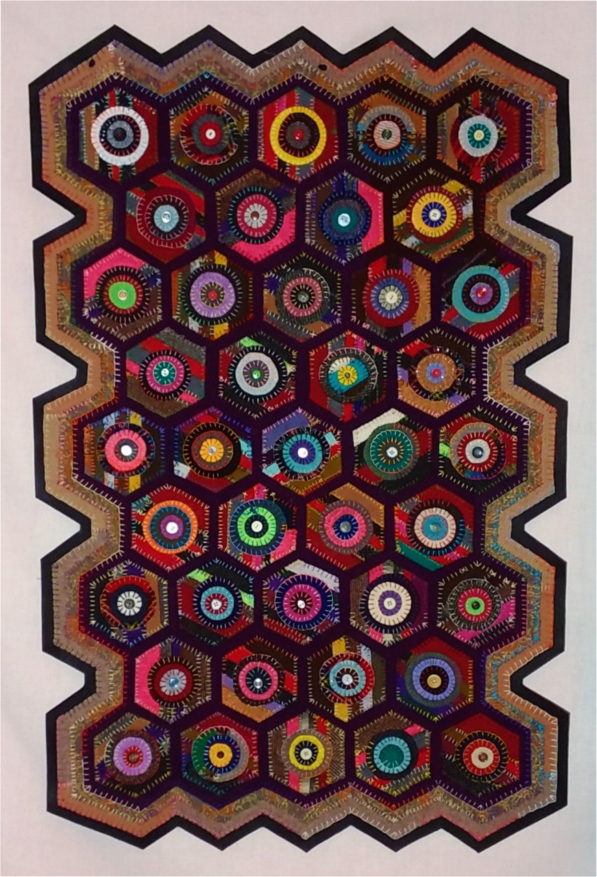 tapestry made with hexagons