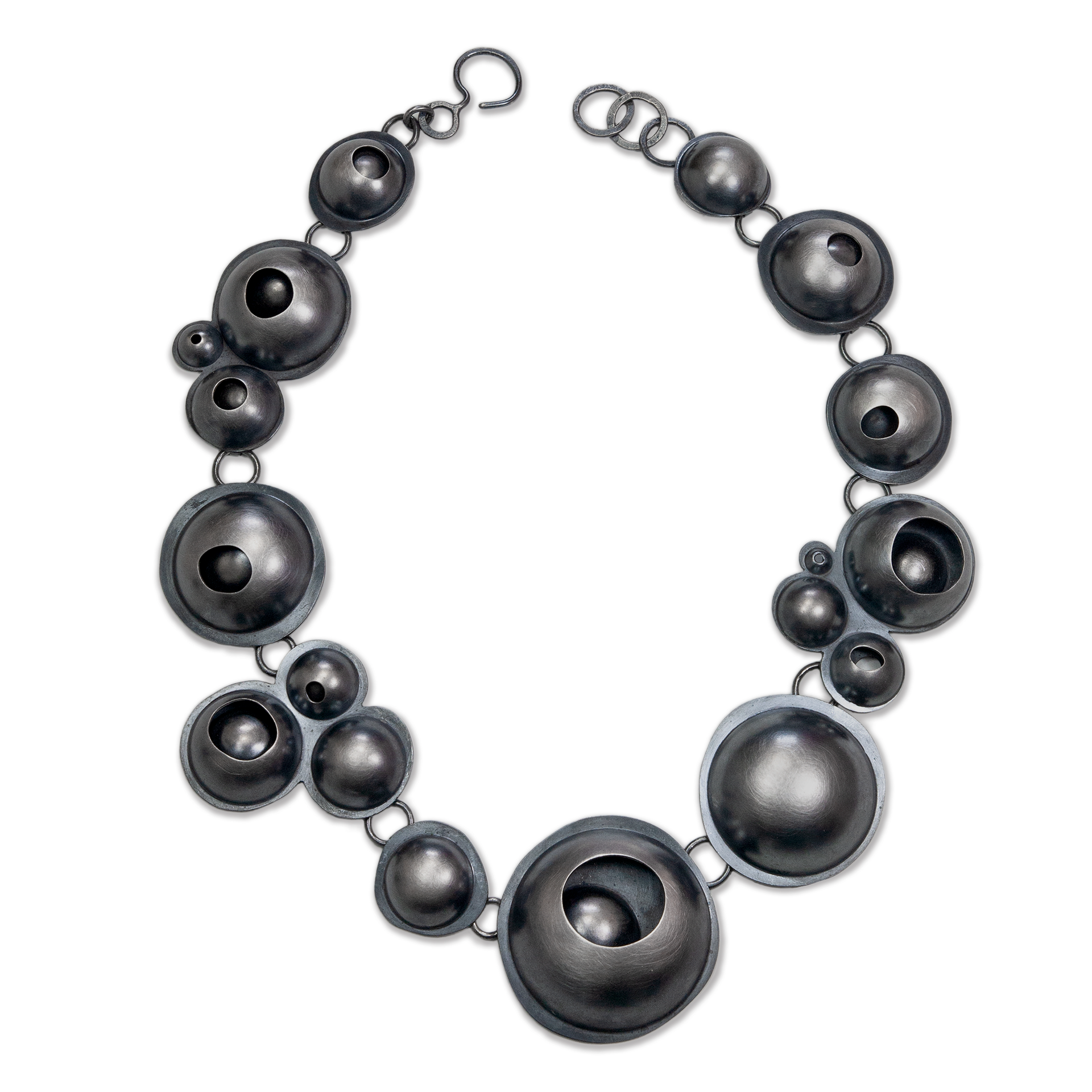 metal necklace with bubble shaped forms
