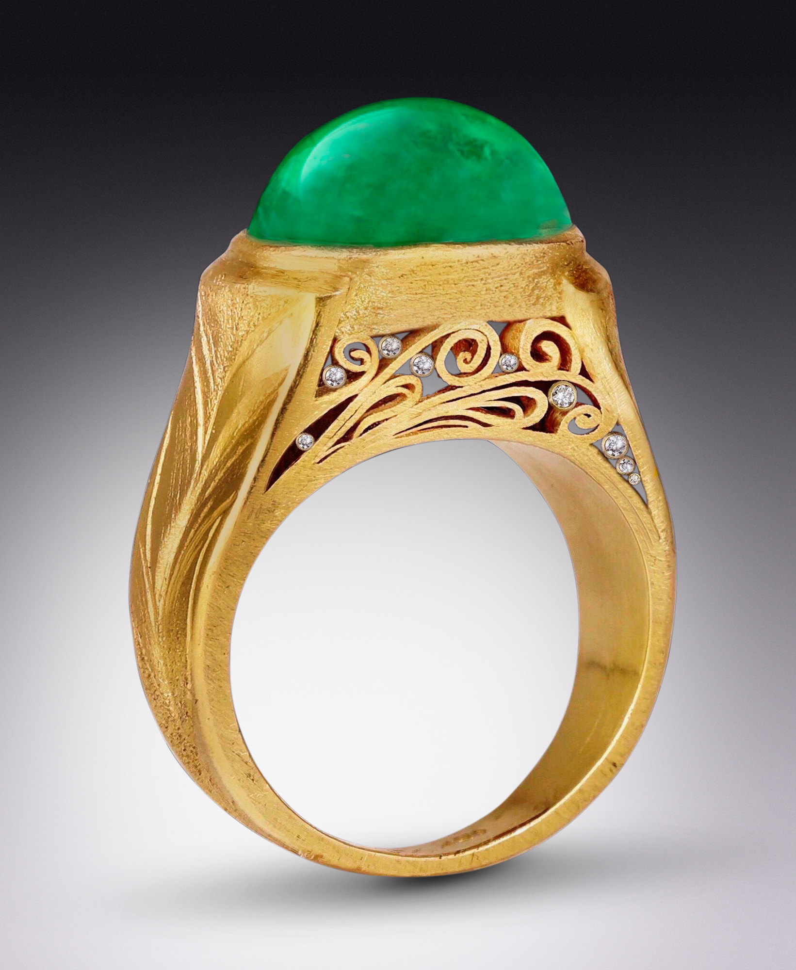 gold ring with green stone