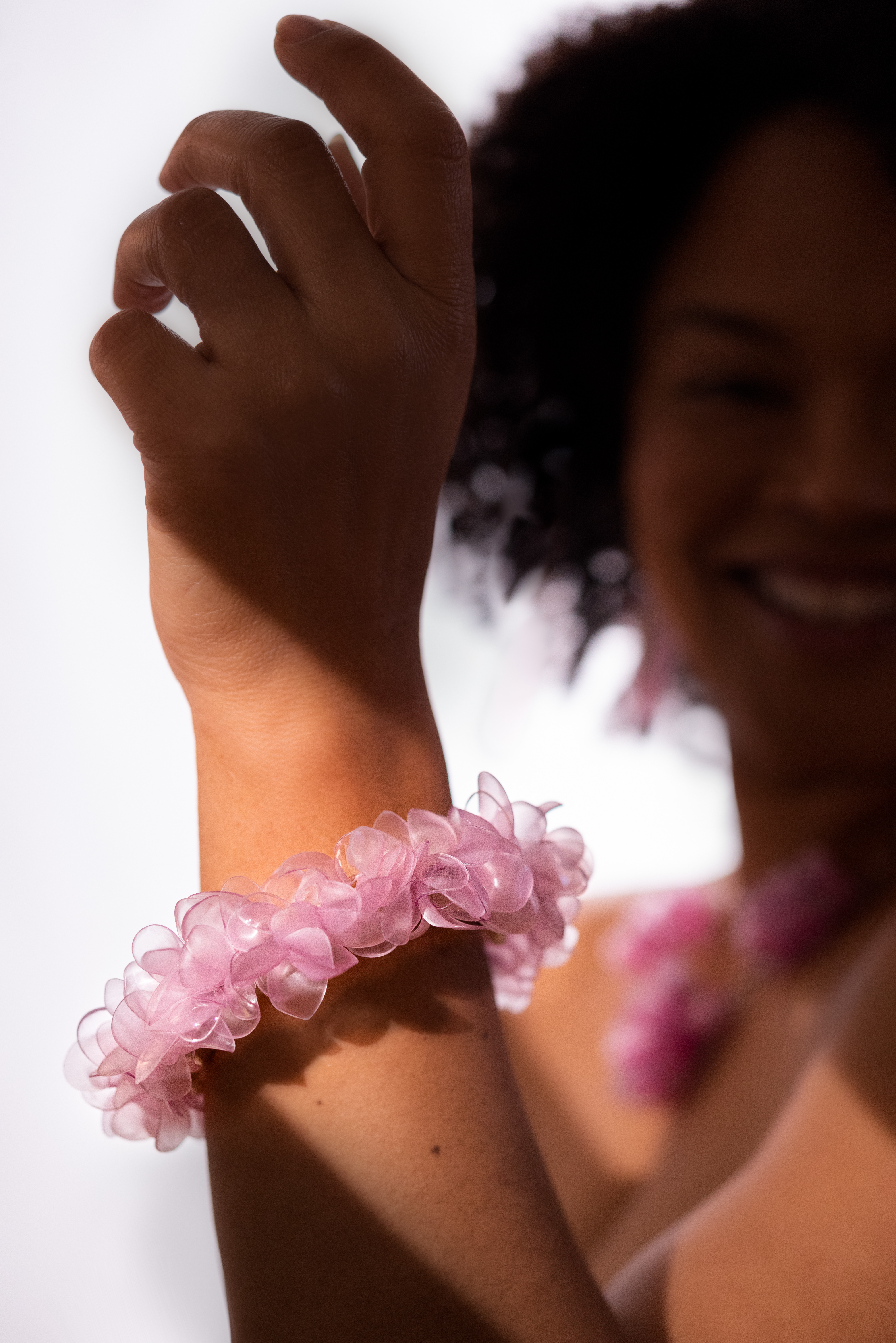 metal cuff bracelet with pink petal-like beads