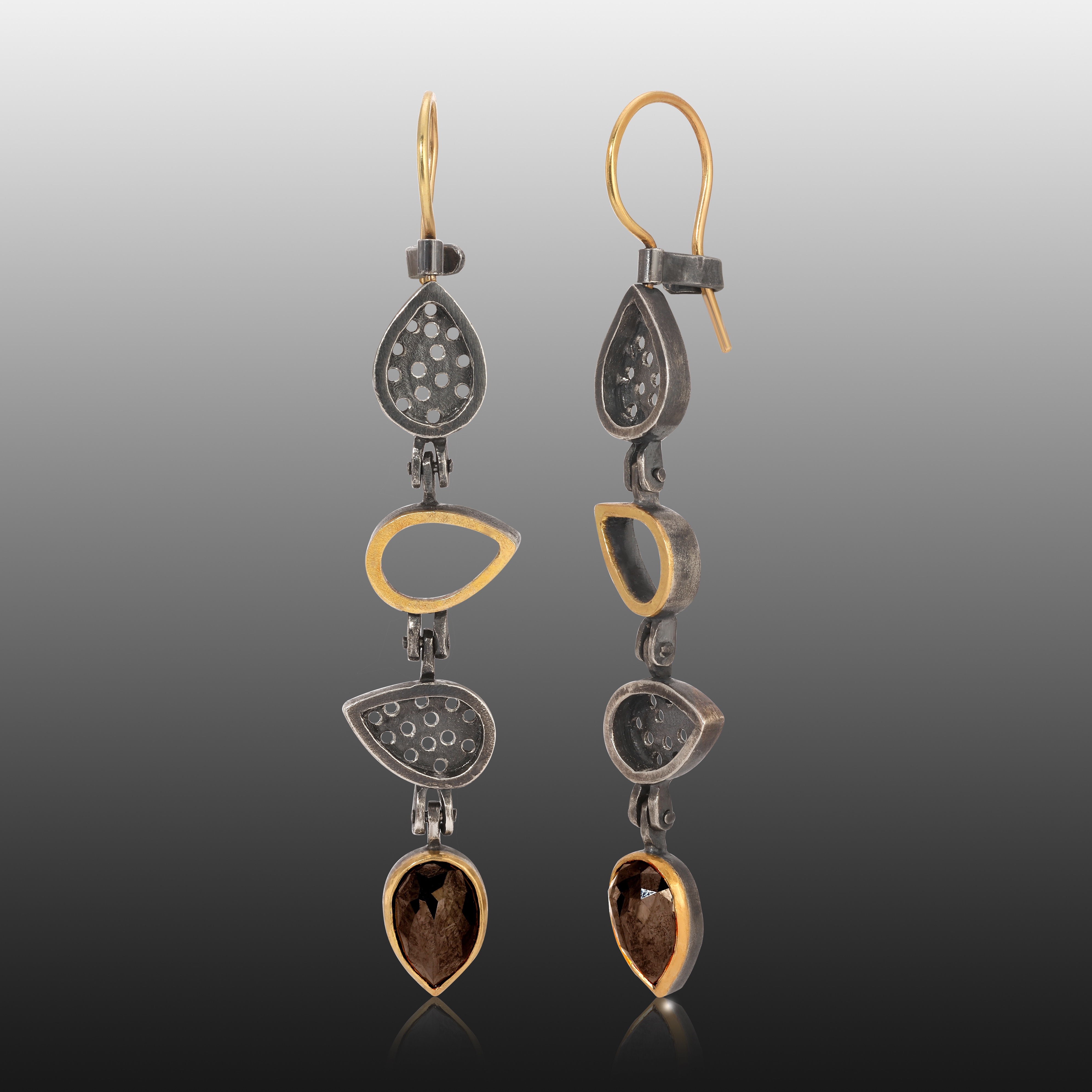 teared dangling earrings with drop shapes