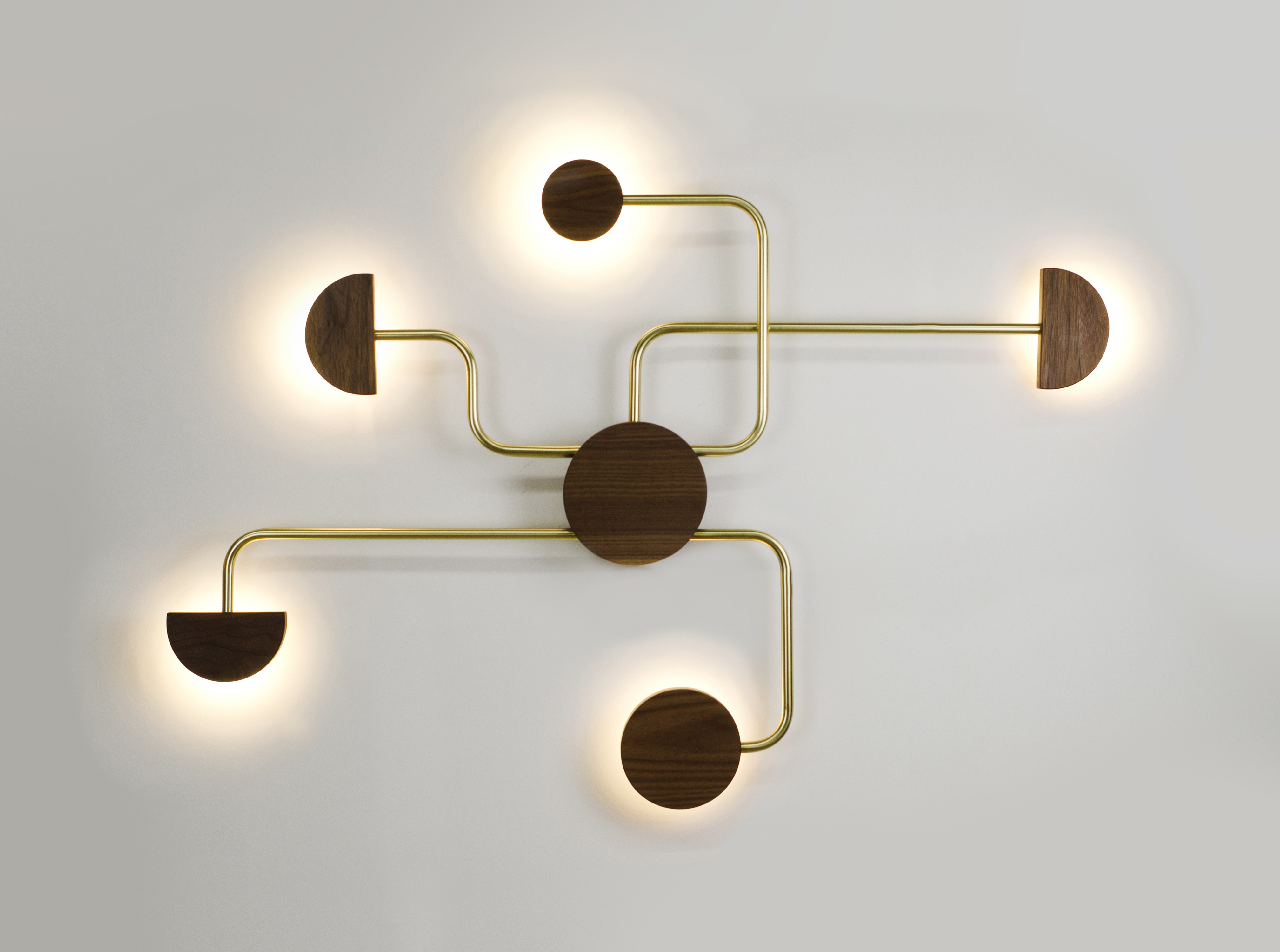 lamp with five light sources emerging from a central circle