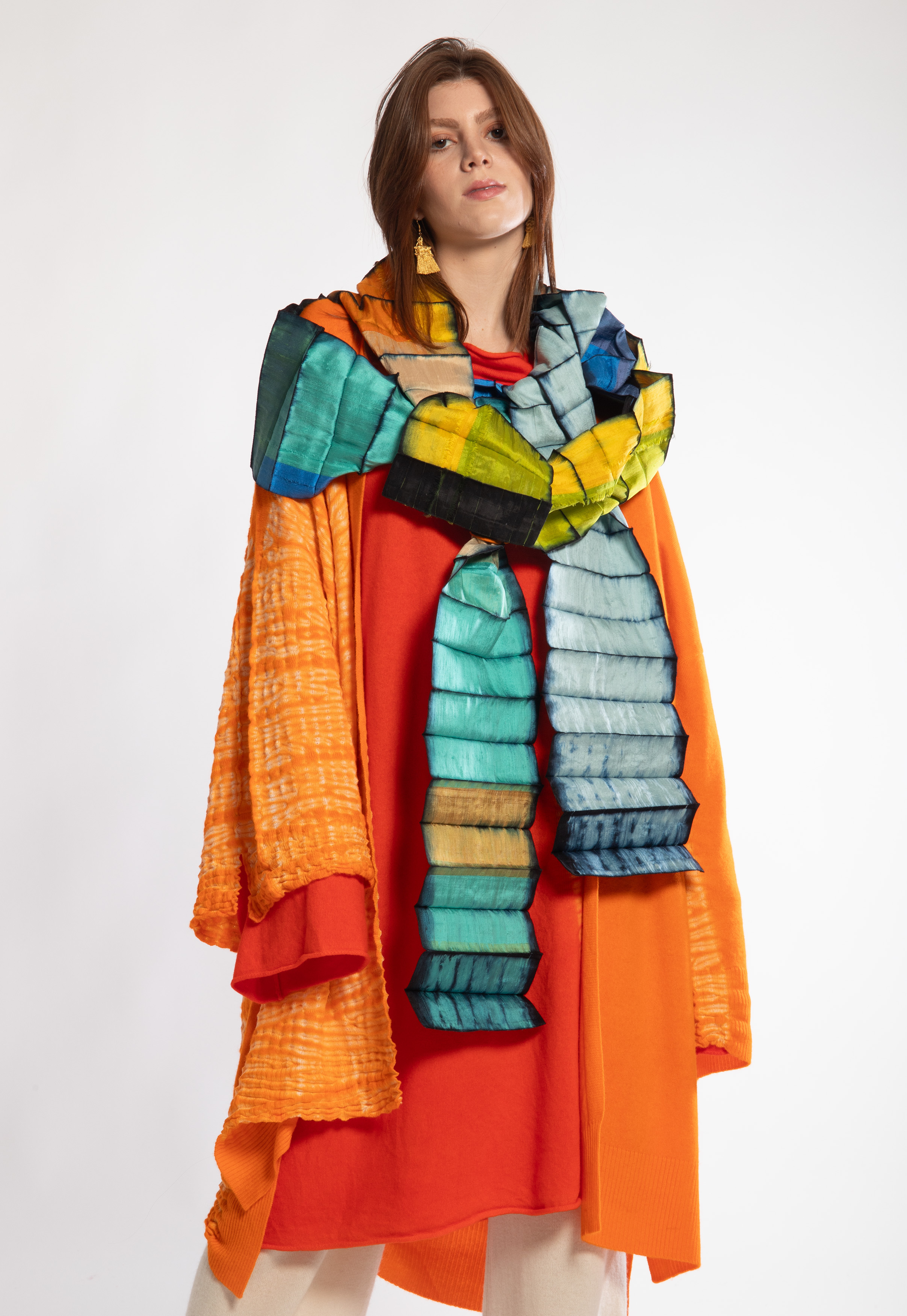 layered orange jacket with scarf