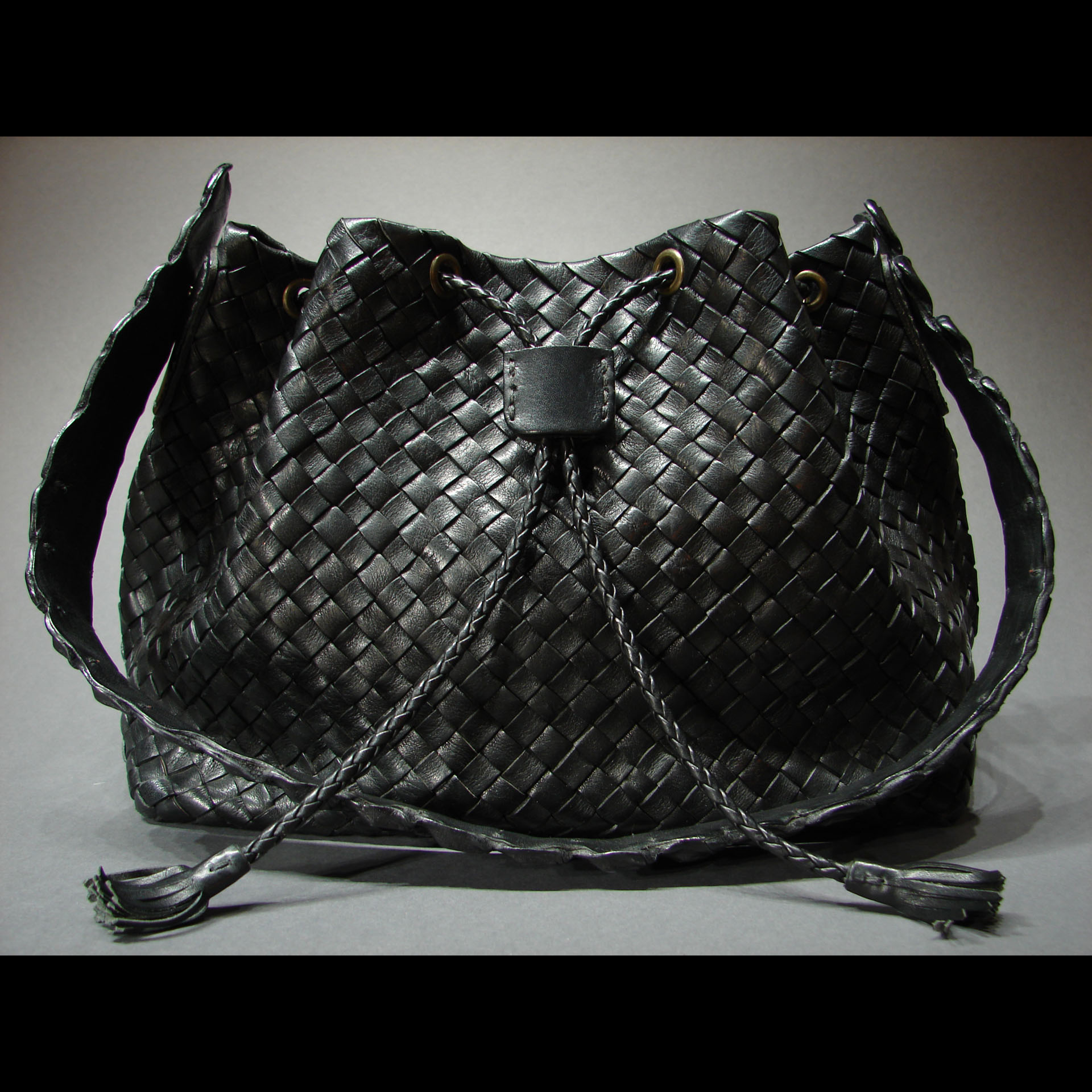 woven leather black purse