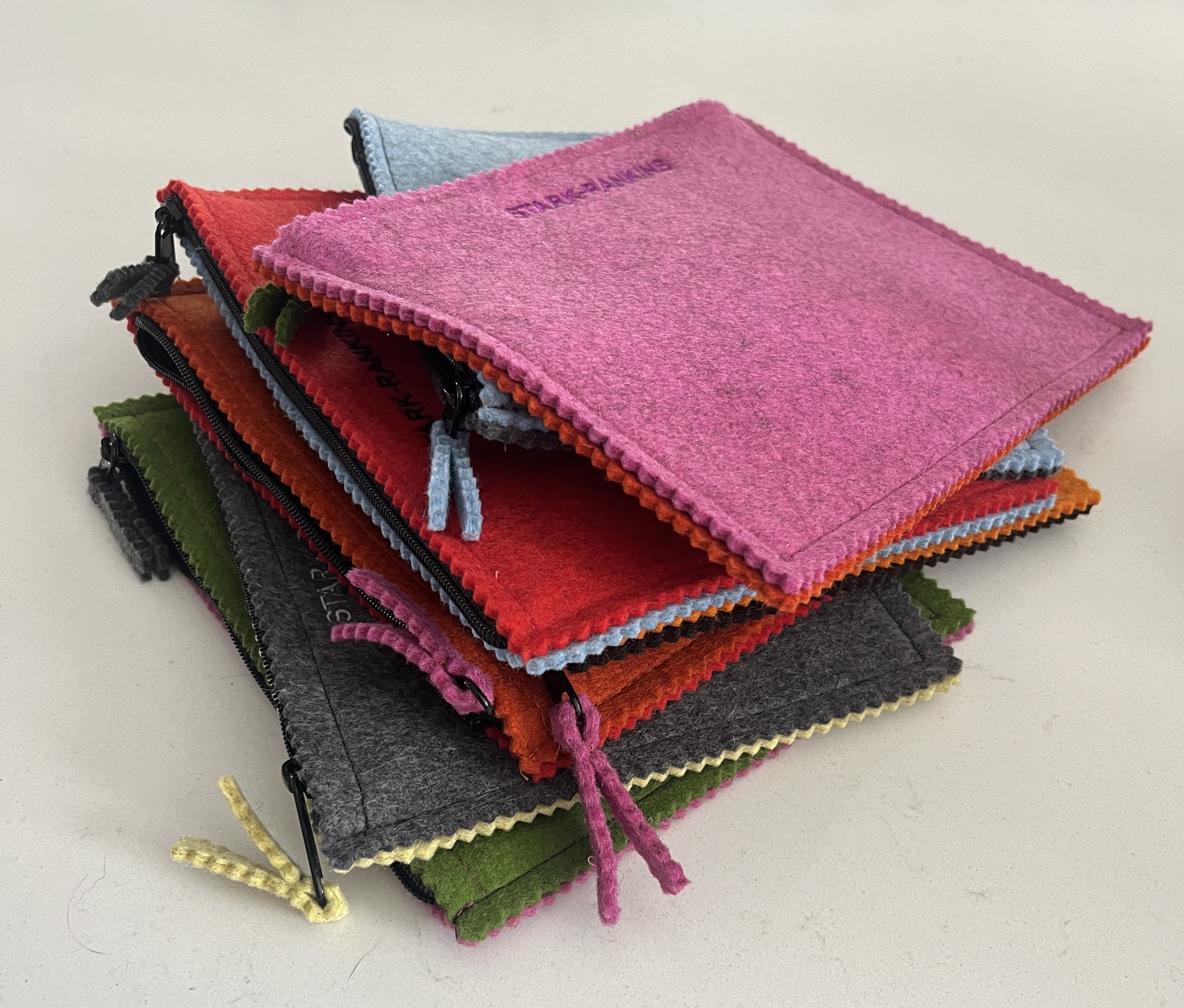 stack of felt zipper bags