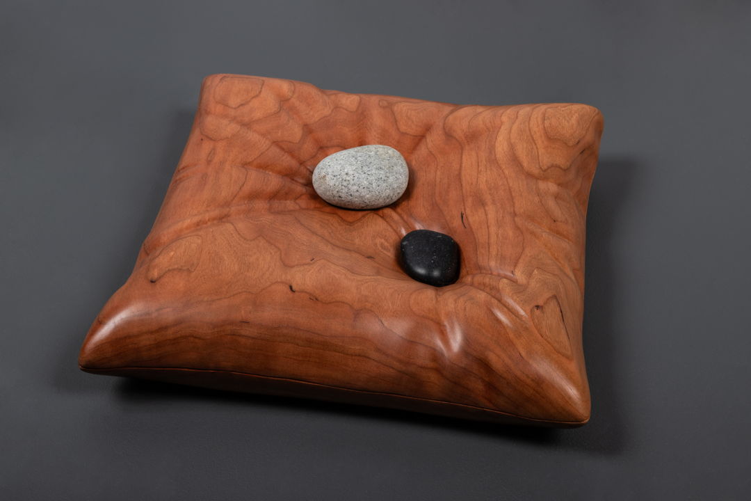 Wood carving in Cherry with found stones
