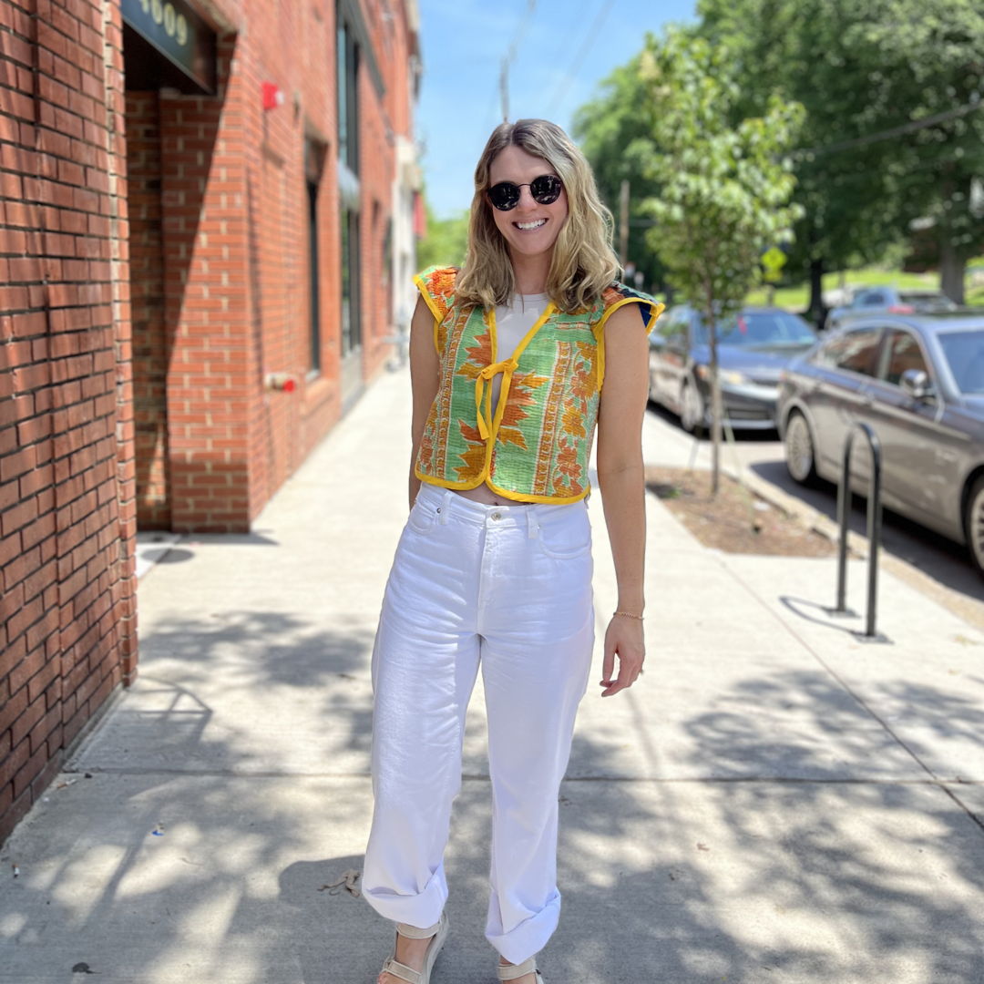 Crafted from remnants of our jacket production  the Amelia Flutter Sleeve Vest features charming flutter sleeves and a reversible design. Boasting tie closures for a personalized fit  this piece seamlessly transitions from casual outings to formal affairs.