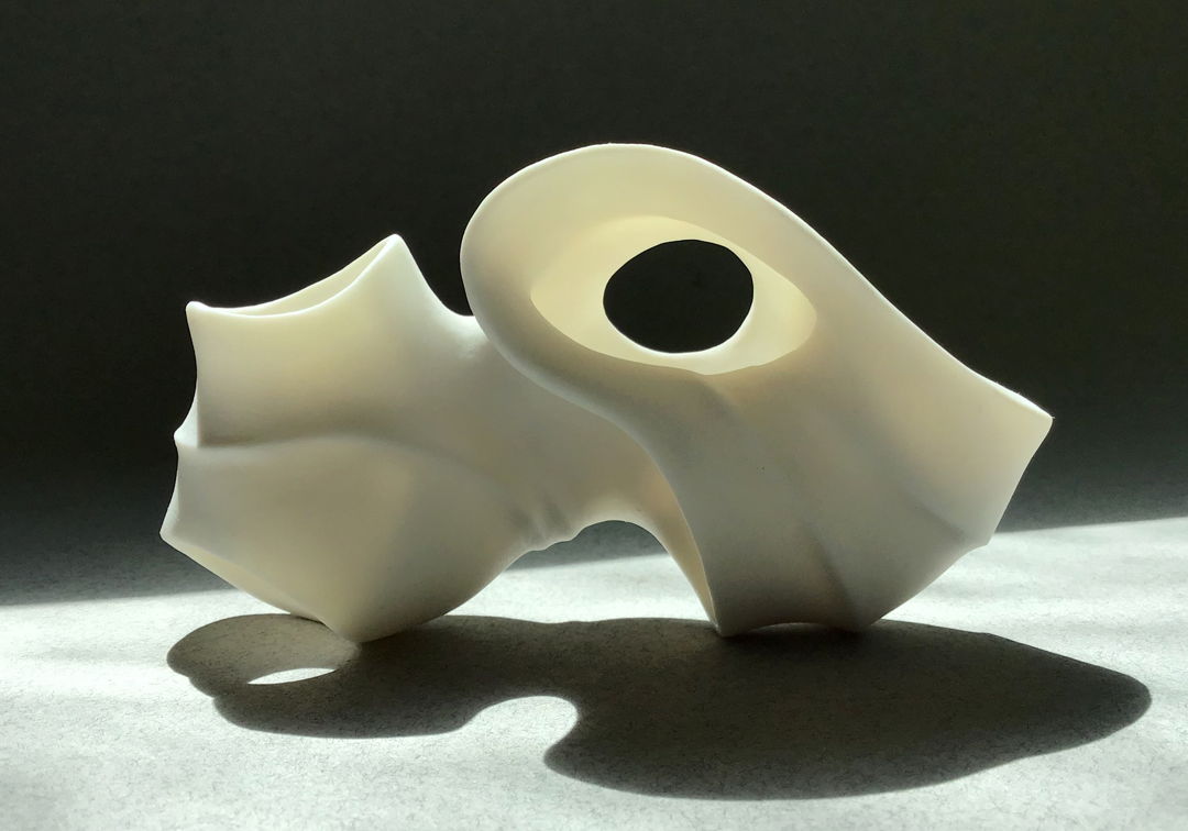 Porcelain sculpture. It has a unglazed surface.