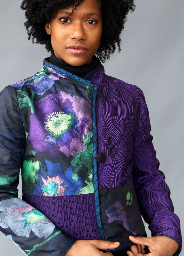 Pieced and pleated silk jacket with handmade buttons and trim.