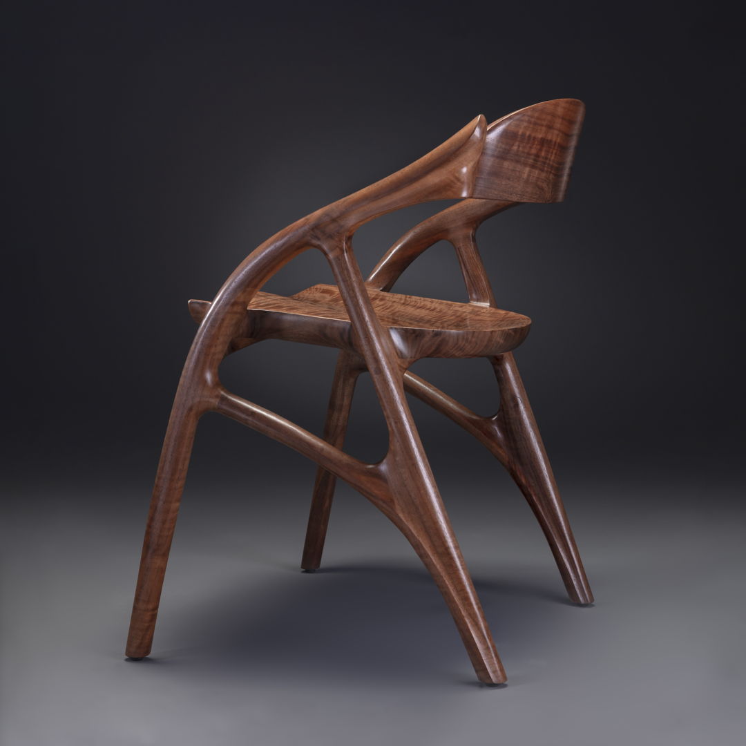 wood chair featuring sweeping curves.