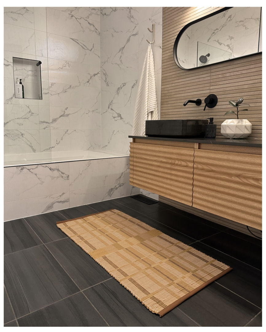 Contemporary rag rug handwoven in 100% cotton yarn and leather strips using the traditional Log Cabin Weave technique