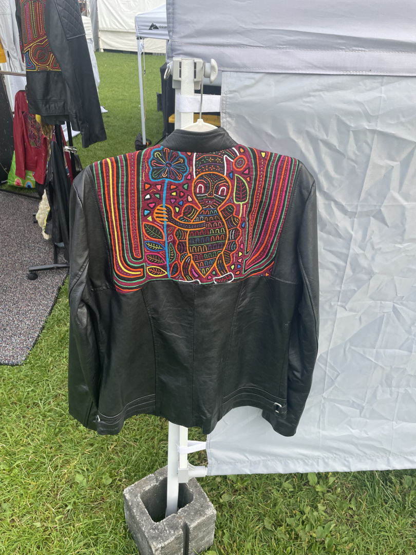 Handmade leather jacket using recycled molas  and recycled leather each jacket is unique