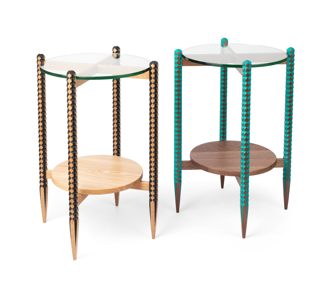 Sidetable - one of them made from walnut  the other from oak wood. The legs are mostly carved on the bandsaw  some details carved by hand. The carvings were then inlaid with paint to make the pattern pop. Lower shelf made from the same type of hardwood as legs  the top shelf is tempered glass