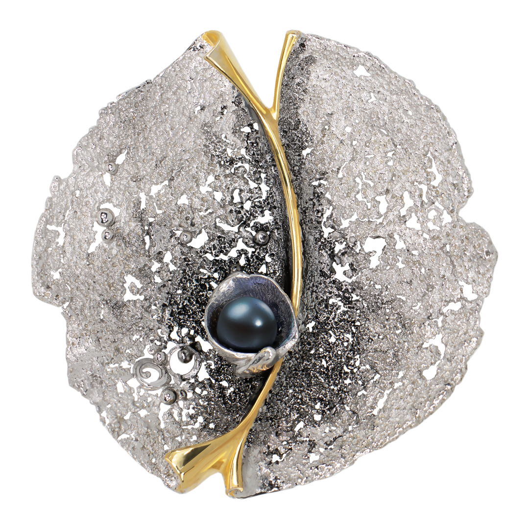 Forgotten in Time Collection. Elements of the composition are organically intertwined  embodying a concept of harmony and unity. The delicate balance of the two halves evokes a sense of rhythm and fluidity; it calls for reflection on the cyclical nature of life  the dynamic interaction of energies.