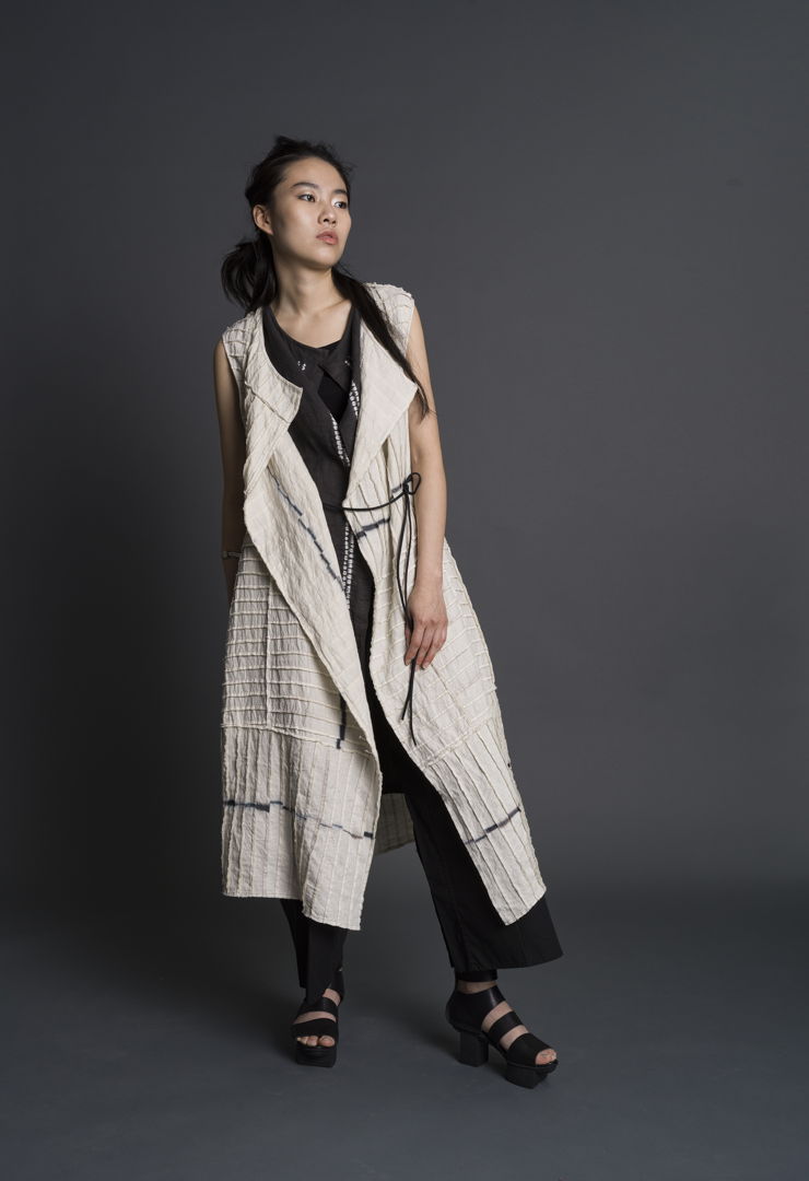 Hand-dyed itajime shibori using sustainable dyes and linen. Deconstructed  hand-cut  pieced  stitched. Hand-patterned. Worn with Cocoon Jinbaori.