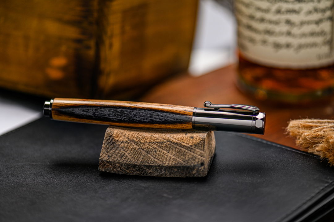 Made of reclaimed KY Bourbon Barrels. This pen has a magnetic cap.