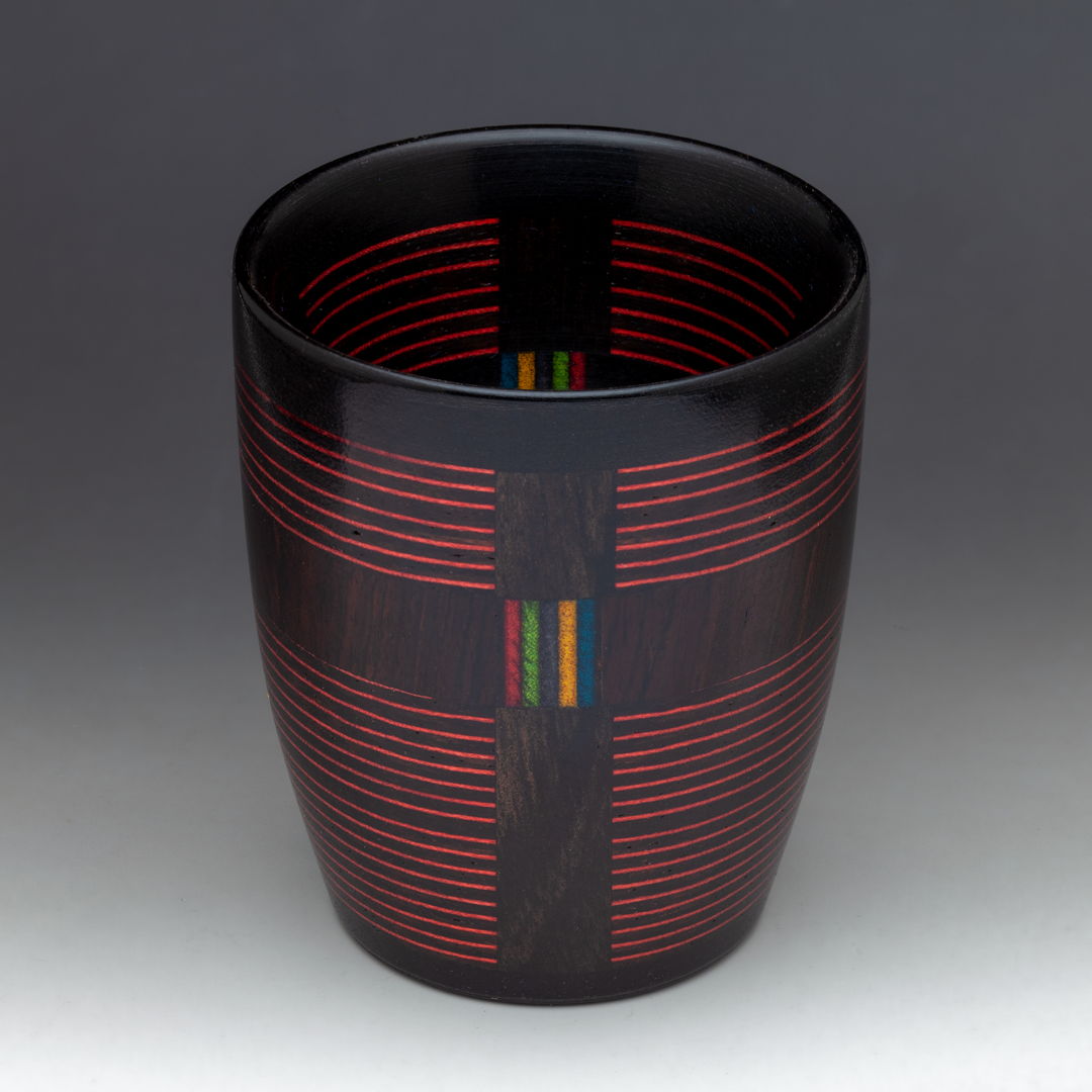 Homage to Chief Joseph inspired by Native American artworks. Ebony and dyed Maple veneer