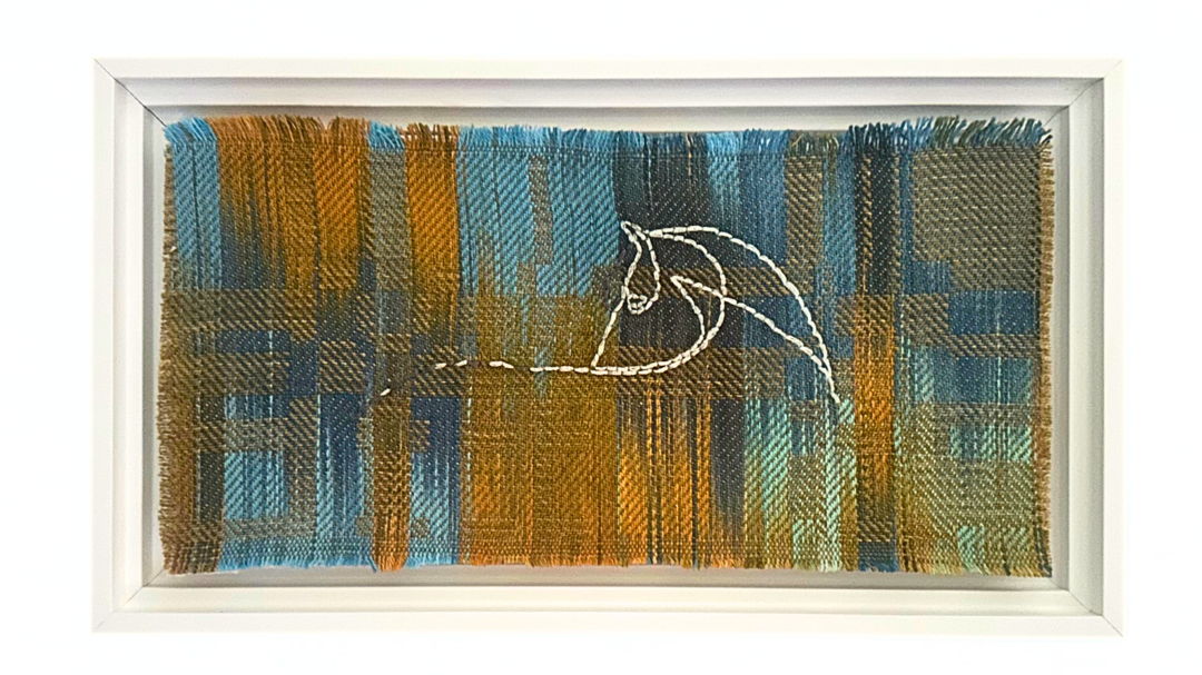 hand woven  hand dyed tencel fabric with hand embroider image of horse on it.