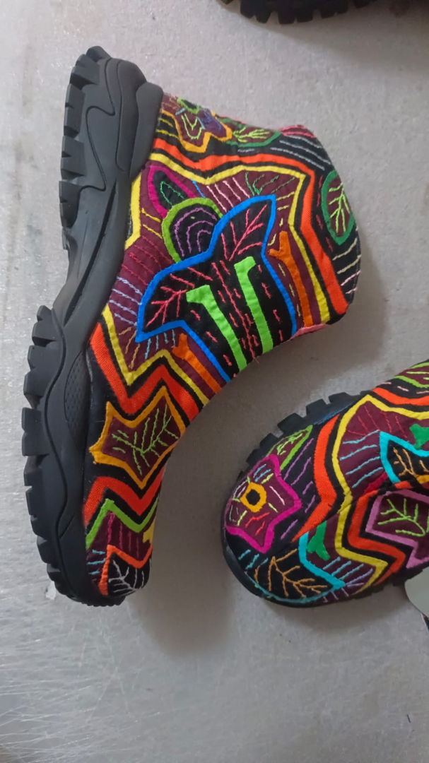 Handmade boots using recycled molas and recycled rubber  each pair is unique