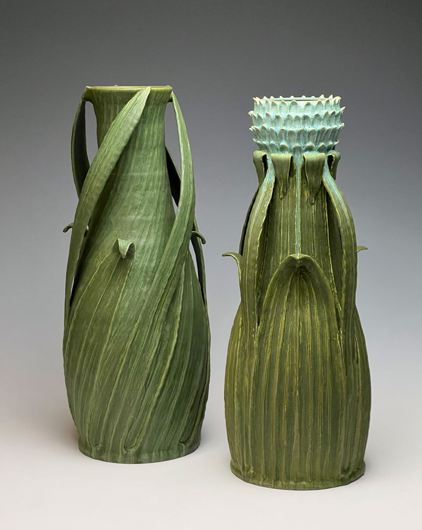 two plant-like earthenware clay vase.