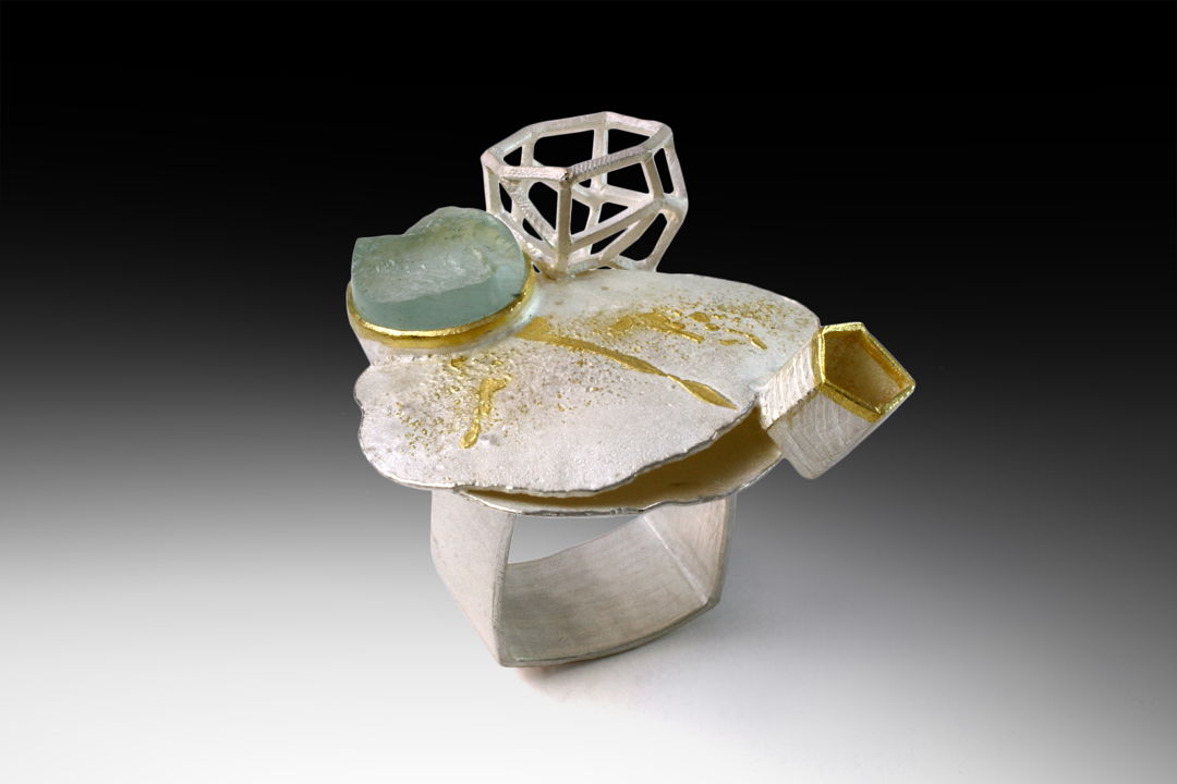 solid and wire structures and juxtaposed together to create a sense of cluster and the rhythm in the space. 18k gold  sterling silver  aquamarine.