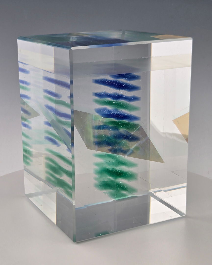 Cast and cold-worked glass  includes dichroic slice.