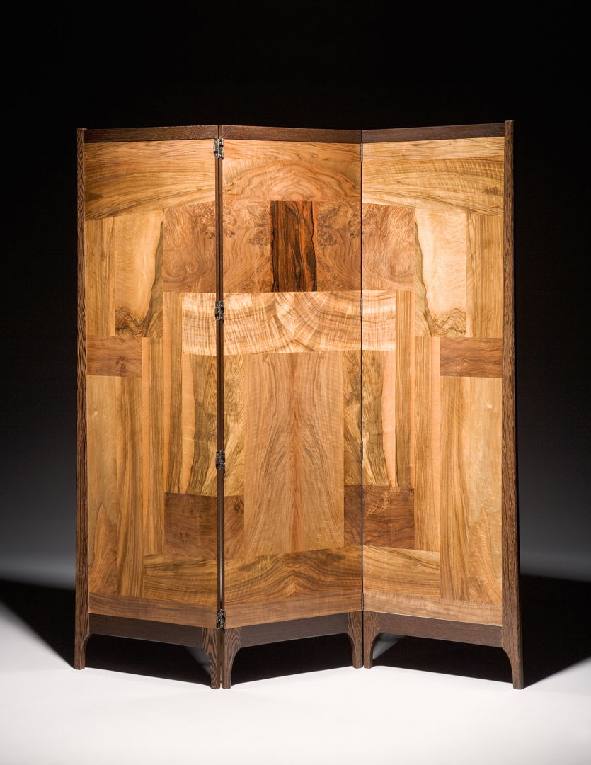 Working with highly figured walnut veneers that I'd been saving for over 30 years  I explored many potential layouts before arriving at the right balance of form and pattern. European Walnut Veneers  Claro Walnut  Torrified Maple  Stainless steel  Shellac  Wax.