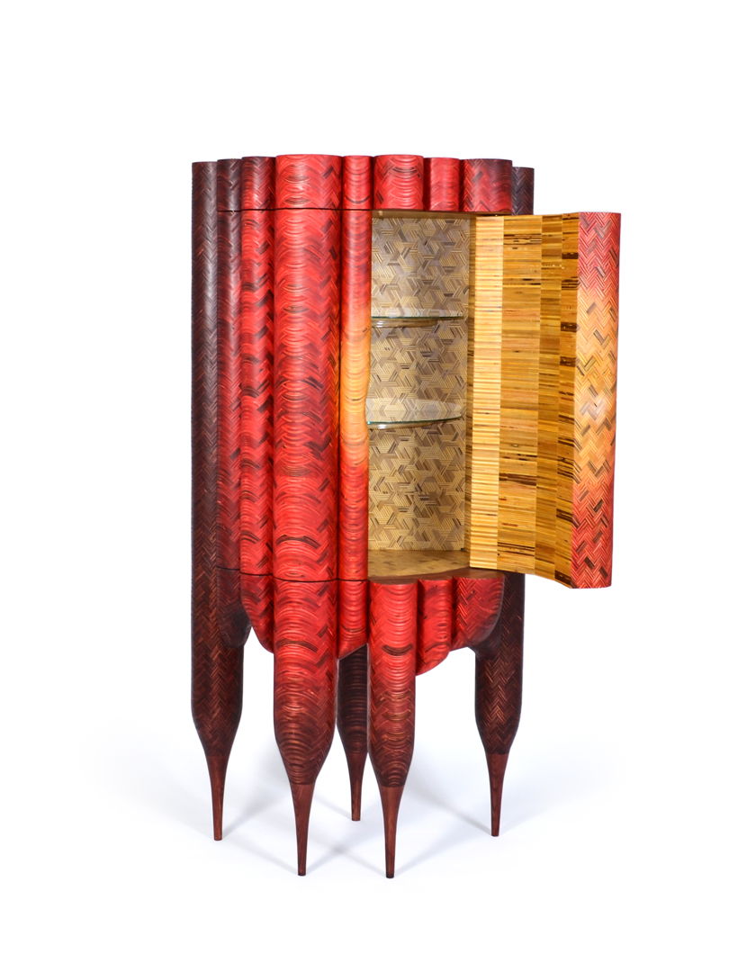 red rounded cabinet with door open