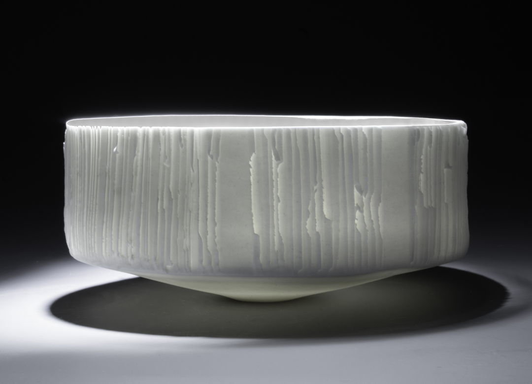 carved and slightly translucent porcelain vessel